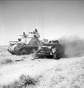 British M3 Tank next to burned Panzer tank in No. Africa, June 1942. Courtesy Imperial War Museum
